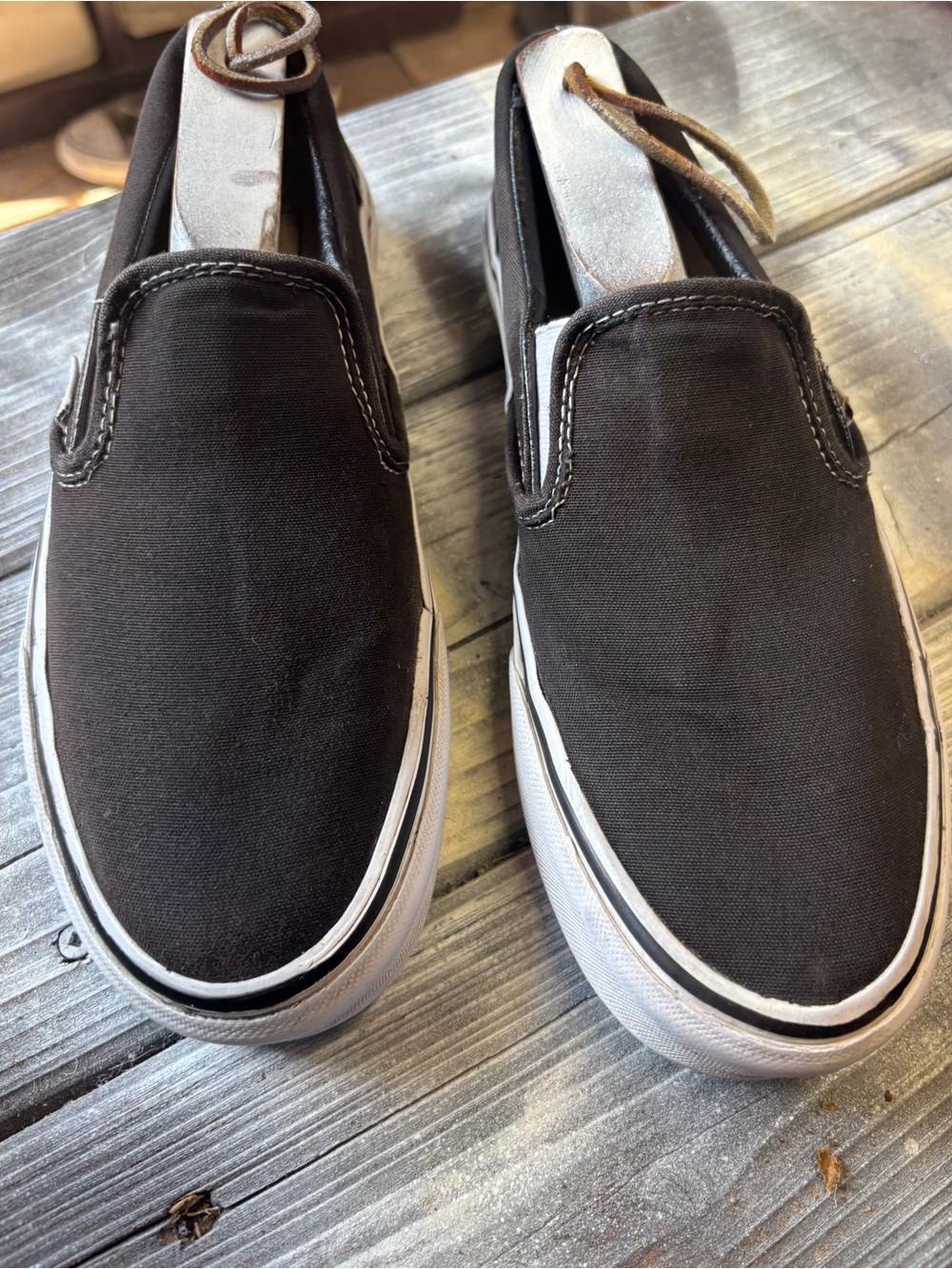 Vans Black Canvas Women's Slip-On Sneakers with White Sole